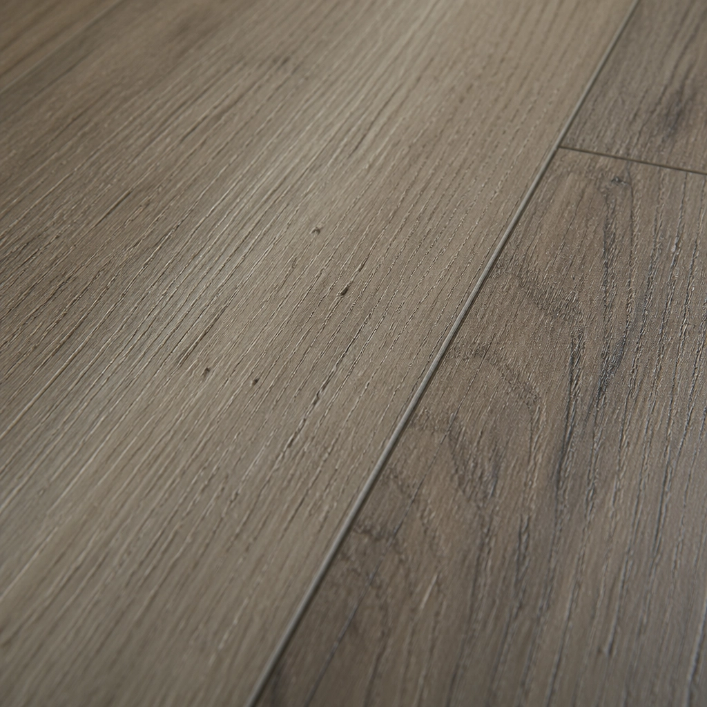 Close-up of wood grain texture and micro-bevel edge on COREtec VV034 flooring