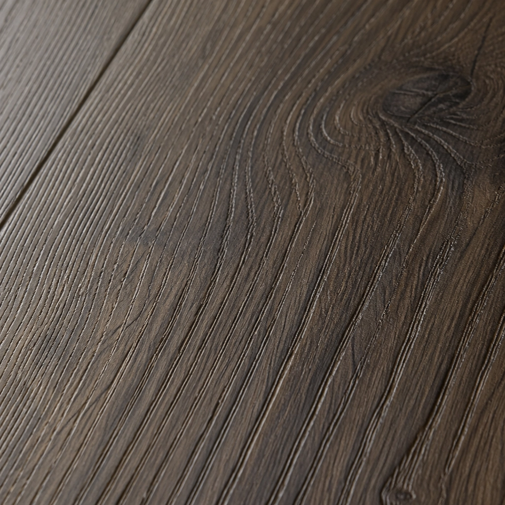 A macro close-up shot of a COREtec luxury vinyl plank showing the realistic wood grain texture and Embossed-in-Register (EIR) detail.