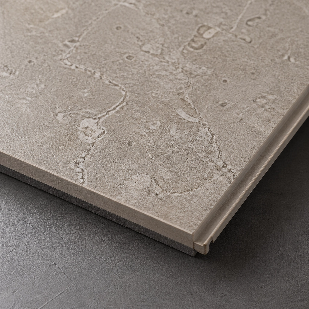 A close-up, high-detail shot of a single VV840-COREtec Tile. The tile features a 20 mil wear layer with an authentic stone texture, showing subtle pits and mineral veins like real limestone.
